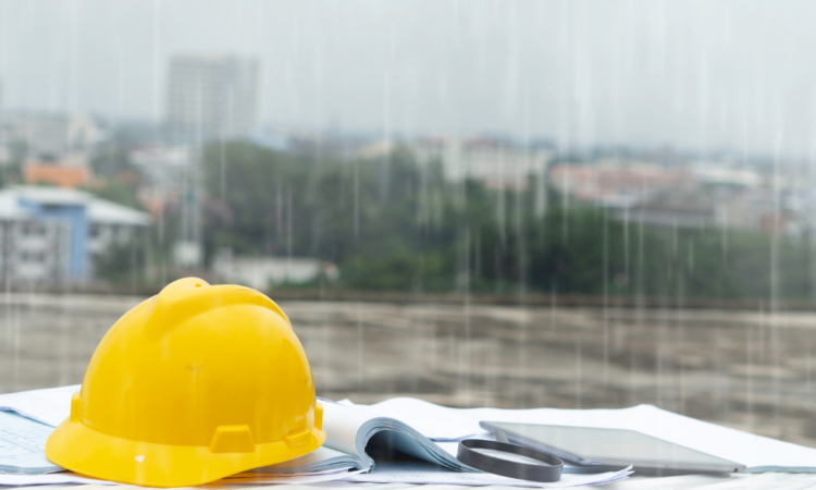 A picture of a bricklayers hat in front of a rainy background